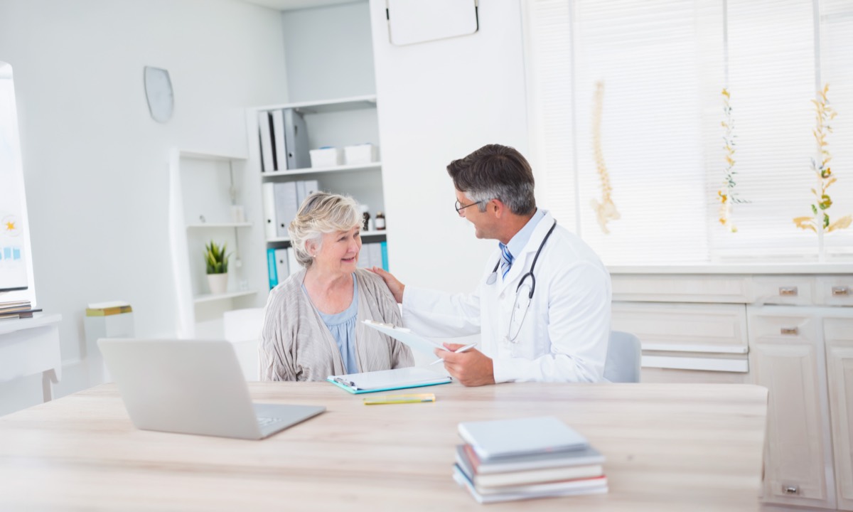 Doctor speaking with a patient about participation in a Prurigo Nodularis clinical study.